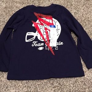 Boys Varsity Football long sleeve shirt.